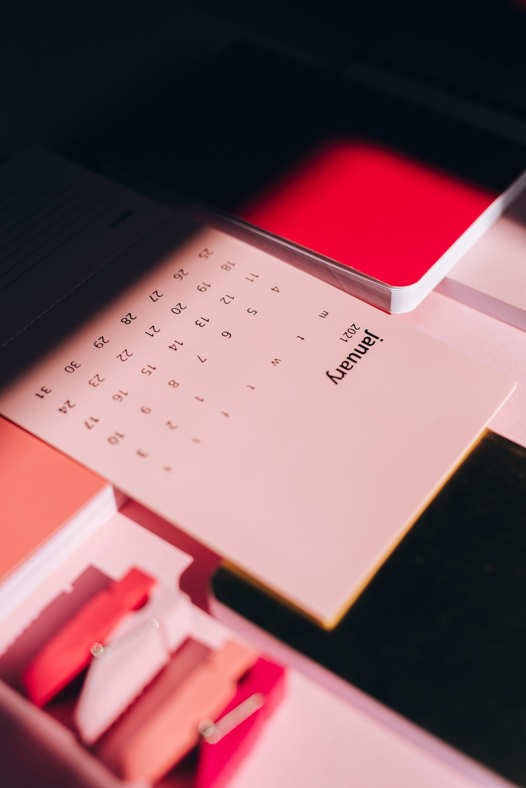 picture of calendar with January 2021 with red accents