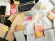 Stock photo from pexels Cottonbro, messy desk with lots of papers and books, some crumpled papers.