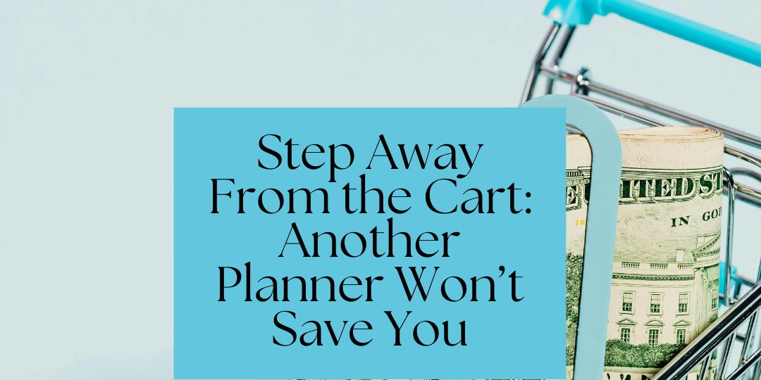 Pic of shopping card with wad of money sitting inside it.